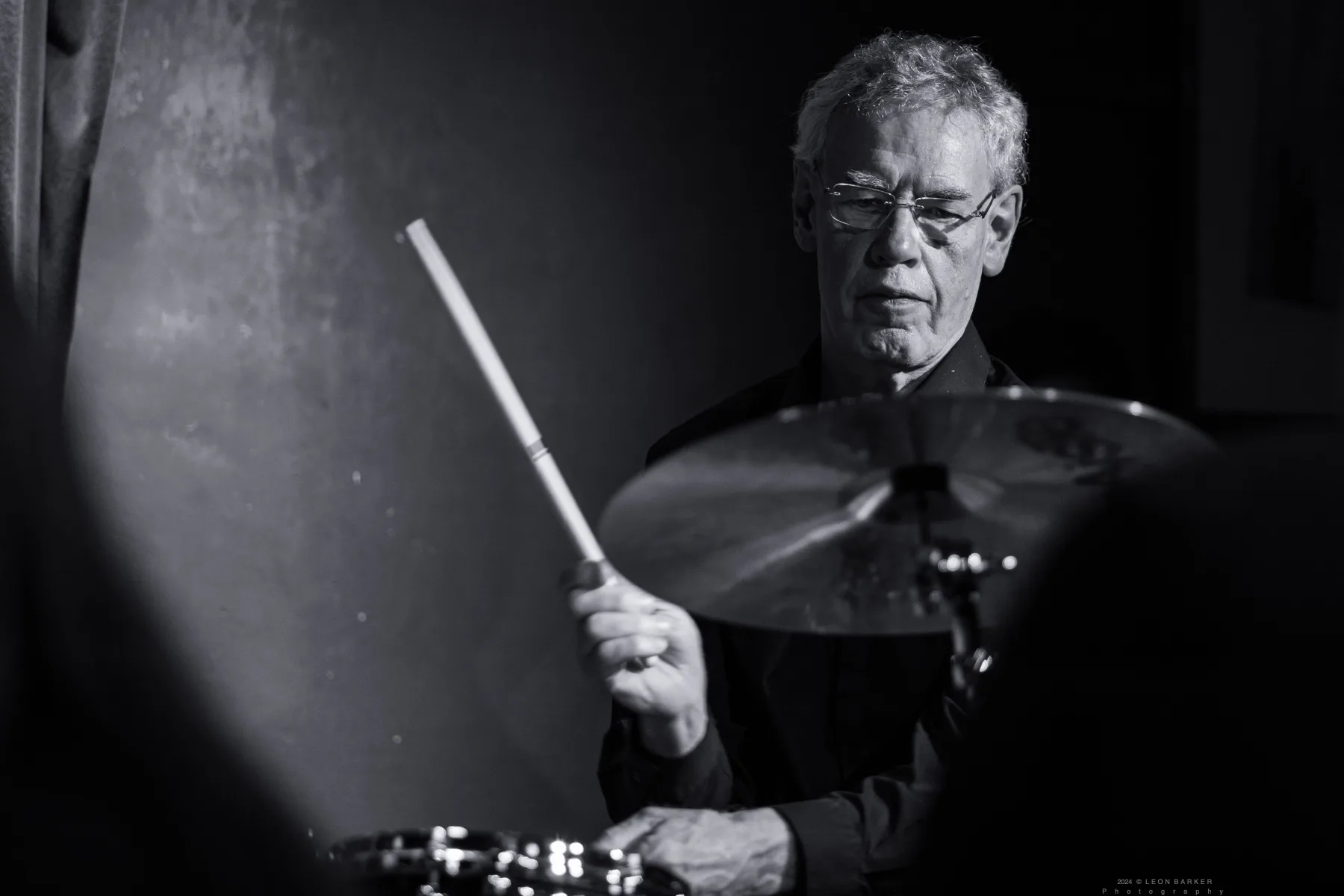 Bill Bruford playing drums during a Pete Roth Trio set.